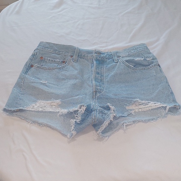 Levi's Pants - Levis Distressed Light Blue Denim Shorts.Size 12 .